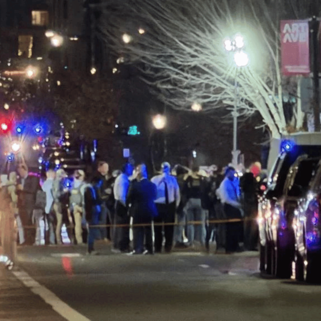 Investigators work the scene of a shooting