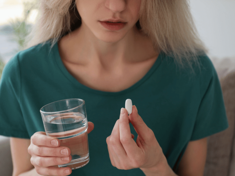 Woman Taking The Abortion Pill